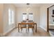 Bright dining area featuring a wood table and lots of natural light, creating an inviting dining space at 1510 Continental Dr, Zionsville, IN 46077