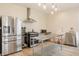 Kitchen featuring stainless steel appliances and ample counter space, perfect for culinary enthusiasts at 1510 Continental Dr, Zionsville, IN 46077