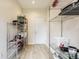 Neat pantry with metal shelving that provides ample storage space for dry goods and supplies at 1510 Continental Dr, Zionsville, IN 46077
