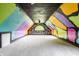 A fun, colorful playroom with a creative design, featuring unique artwork and a cozy atmosphere at 1510 Continental Dr, Zionsville, IN 46077
