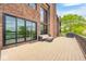 Wooden back deck featuring outdoor furniture and grill, perfect for entertaining and relaxing outdoors at 16285 Remington Dr, Fishers, IN 46037