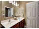 Bathroom vanity with double sinks, cabinet storage, and a large mirror enhancing the room's functionality at 16285 Remington Dr, Fishers, IN 46037