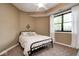 Cozy bedroom with a double bed, soft textures, and a window, creating a restful retreat at 16285 Remington Dr, Fishers, IN 46037