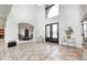 Grand two-story foyer with tile flooring, soaring ceilings, and elegant architectural details at 16285 Remington Dr, Fishers, IN 46037