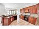 Well-appointed kitchen with custom cabinets, granite countertops, and modern appliances at 16285 Remington Dr, Fishers, IN 46037