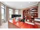 Home office featuring built-in bookshelves, and large windows at 16285 Remington Dr, Fishers, IN 46037