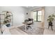 Home office with a sit-stand desk, modern decor, and large windows for natural light at 16285 Remington Dr, Fishers, IN 46037