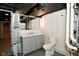 Finished basement bathroom with gray vanity and modern fixtures at 1701 Lincoln Rd, Speedway, IN 46224