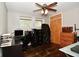 Bedroom featuring hardwood floors, a ceiling fan and closet space for storage at 1701 Lincoln Rd, Speedway, IN 46224