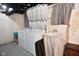Basement laundry room with washing machine, dryer, and utility sink at 1701 Lincoln Rd, Speedway, IN 46224