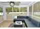Comfortable screened porch with outdoor seating and scenic views at 1701 Lincoln Rd, Speedway, IN 46224