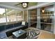 Comfortable sunroom with a ceiling fan and sliding glass doors at 1701 Lincoln Rd, Speedway, IN 46224
