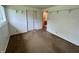 Bedroom with carpeted floors, closet, and bright windows at 1949 Shenandoah Pl, Indianapolis, IN 46229
