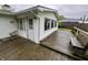 Wooden deck featuring a private entrance into the home and a backyard view at 1949 Shenandoah Pl, Indianapolis, IN 46229