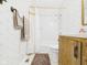 Standard bathroom features a shower, sink, and toilet with neutral colored walls and fixtures at 209 E 35Th St, Anderson, IN 46013