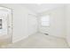 Empty bedroom with natural light, closet and neutral carpet offering a calm and spacious environment at 209 E 35Th St, Anderson, IN 46013