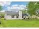 Backyard featuring fenced in space with a patio and exterior of the home for sale at 2444 S Brandywine Ct, Greenfield, IN 46140