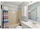 Bathroom featuring a shower-tub combo, vanity, and neutral color scheme at 2444 S Brandywine Ct, Greenfield, IN 46140