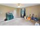 Spacious bedroom with guitars, a ceiling fan and a chest of drawers in a home for sale at 2444 S Brandywine Ct, Greenfield, IN 46140