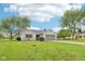 Charming ranch-style home with an attached two-car garage and a beautifully maintained lawn and landscaping at 2444 S Brandywine Ct, Greenfield, IN 46140