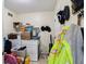 Laundry room featuring washer, dryer, shelves and storage space in a home for sale at 2444 S Brandywine Ct, Greenfield, IN 46140