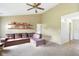 Bright living room showcasing built-in shelving, comfortable seating, and plenty of natural light at 2444 S Brandywine Ct, Greenfield, IN 46140