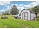 Outbuilding and utility vehicle on a spacious, well-maintained lot at 2444 S Brandywine Ct, Greenfield, IN 46140