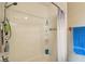 Shower with plastic surround and shelving for shampoo and soap in a home for sale at 2444 S Brandywine Ct, Greenfield, IN 46140