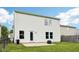 Spacious yard with a door, concrete patio, and green grass at 2545 Harvest Moon Dr, Greenwood, IN 46143