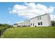 Spacious, grassy yard with a chain-link fence at 2545 Harvest Moon Dr, Greenwood, IN 46143