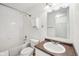 Clean bathroom featuring a shower and bath, toilet, vanity and mirror with storage at 2545 Harvest Moon Dr, Greenwood, IN 46143