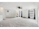 Vast bedroom with ample natural light, ceiling fan, and neutral-colored carpeting at 2545 Harvest Moon Dr, Greenwood, IN 46143