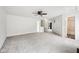 Large bedroom with multiple doorways, neutral paint, and comfortable neutral carpet at 2545 Harvest Moon Dr, Greenwood, IN 46143