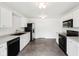 Bright kitchen with black appliances, ample counter space, and neutral walls at 2545 Harvest Moon Dr, Greenwood, IN 46143