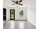 Bright living room featuring an exterior door leading to backyard views at 2545 Harvest Moon Dr, Greenwood, IN 46143