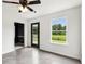 Bright living room featuring an exterior door leading to backyard views at 2545 Harvest Moon Dr, Greenwood, IN 46143