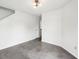 Bright living room with neutral walls, polished floors, and contemporary lighting fixtures at 2545 Harvest Moon Dr, Greenwood, IN 46143