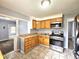 Open kitchen layout featuring stainless steel appliances and ample counter space at 2737 S Roena St, Indianapolis, IN 46241