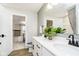 Stylish bathroom with dual sink vanity, matte black fixtures and modern decor at 3873 Goodwin Dr, Zionsville, IN 46077