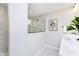 Bright, clean bathroom featuring white cabinets, marble floors, and a glass shower at 3873 Goodwin Dr, Zionsville, IN 46077