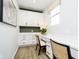 Bright home office featuring built-in shelving, a large window, and modern decor at 3873 Goodwin Dr, Zionsville, IN 46077