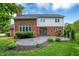 Well-maintained backyard with a patio and lush green landscaping at 3996 Brockton Manor N Dr, Greenwood, IN 46143