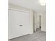 Bedroom featuring double closets and neutral carpet at 3996 Brockton Manor N Dr, Greenwood, IN 46143