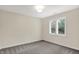 Comfortable bedroom showcases natural light and neutral carpet at 3996 Brockton Manor N Dr, Greenwood, IN 46143