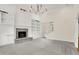 Spacious room featuring a stone fireplace and built-in shelving at 3996 Brockton Manor N Dr, Greenwood, IN 46143