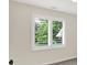 A picture of a window with white shutters, providing natural light and view at 3996 Brockton Manor N Dr, Greenwood, IN 46143