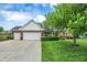 Charming brick and siding home with a well-manicured lawn and attached two-car garage at 3996 Brockton Manor N Dr, Greenwood, IN 46143