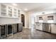 Updated kitchen with stainless steel appliances, custom cabinetry, and a beverage center at 413 E 40Th St, Indianapolis, IN 46205