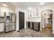 Bright kitchen featuring stainless steel appliances, a wine cooler, and custom cabinetry at 413 E 40Th St, Indianapolis, IN 46205