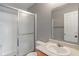 Bathroom featuring glass-enclosed shower, neutral walls, and updated fixtures for a refreshed feel at 4136 Orchard Valley Ln, Indianapolis, IN 46235